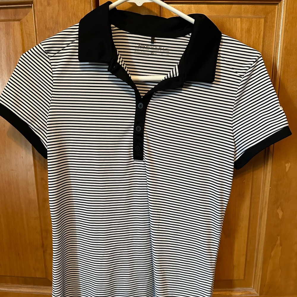 Nike black and white striped women’s golf shirt